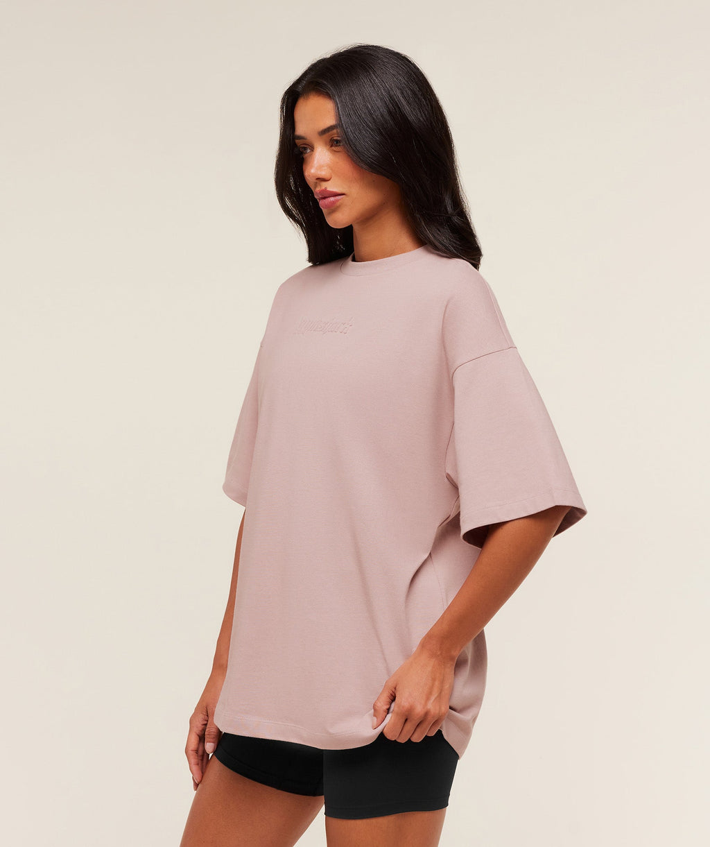 gymshark-embossed-graphic-oversized-t-shirt-ss-tops-pink-aw25