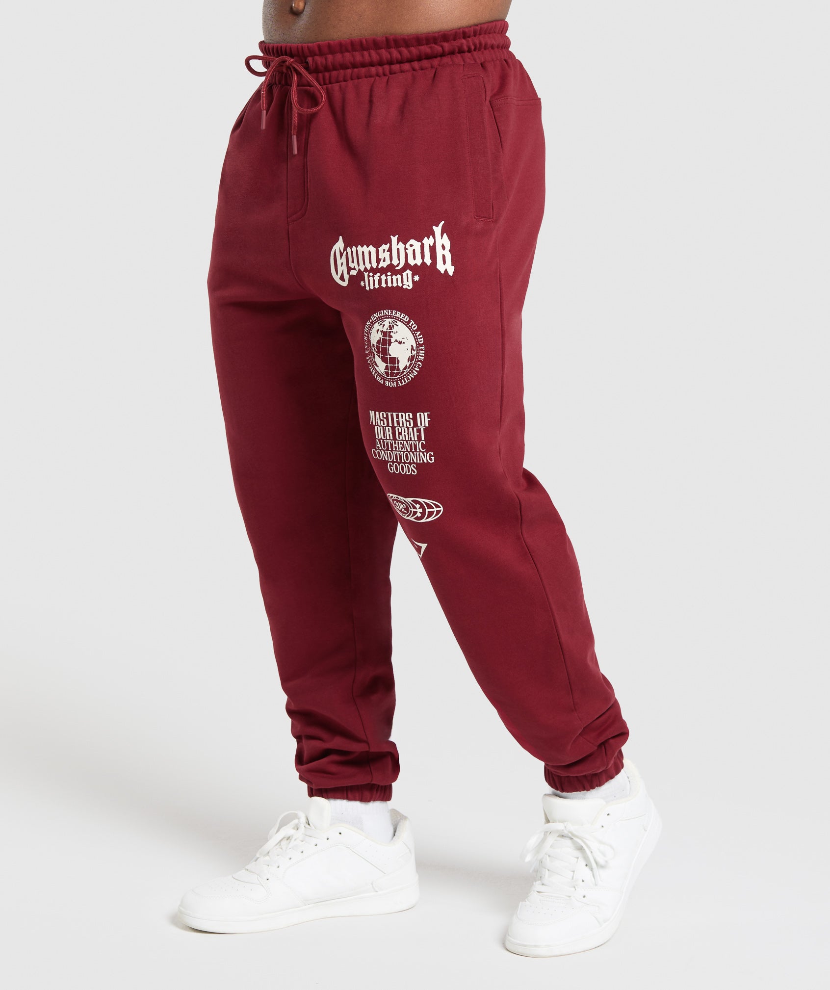 gymshark-global-lifting-oversized-joggers-pants-red-ss25