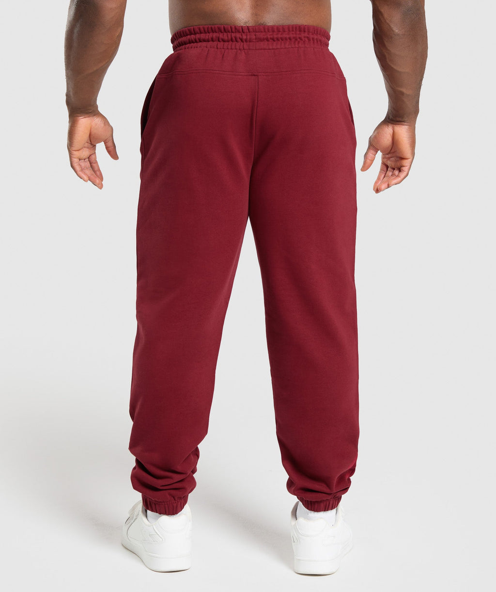 gymshark-global-lifting-oversized-joggers-pants-red-ss25