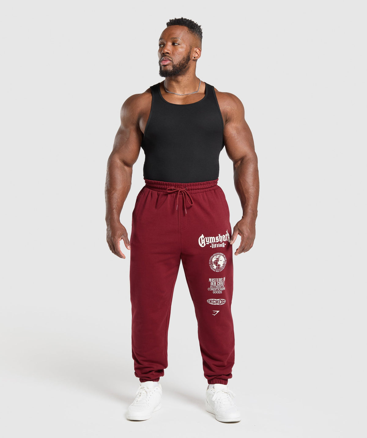gymshark-global-lifting-oversized-joggers-pants-red-ss25
