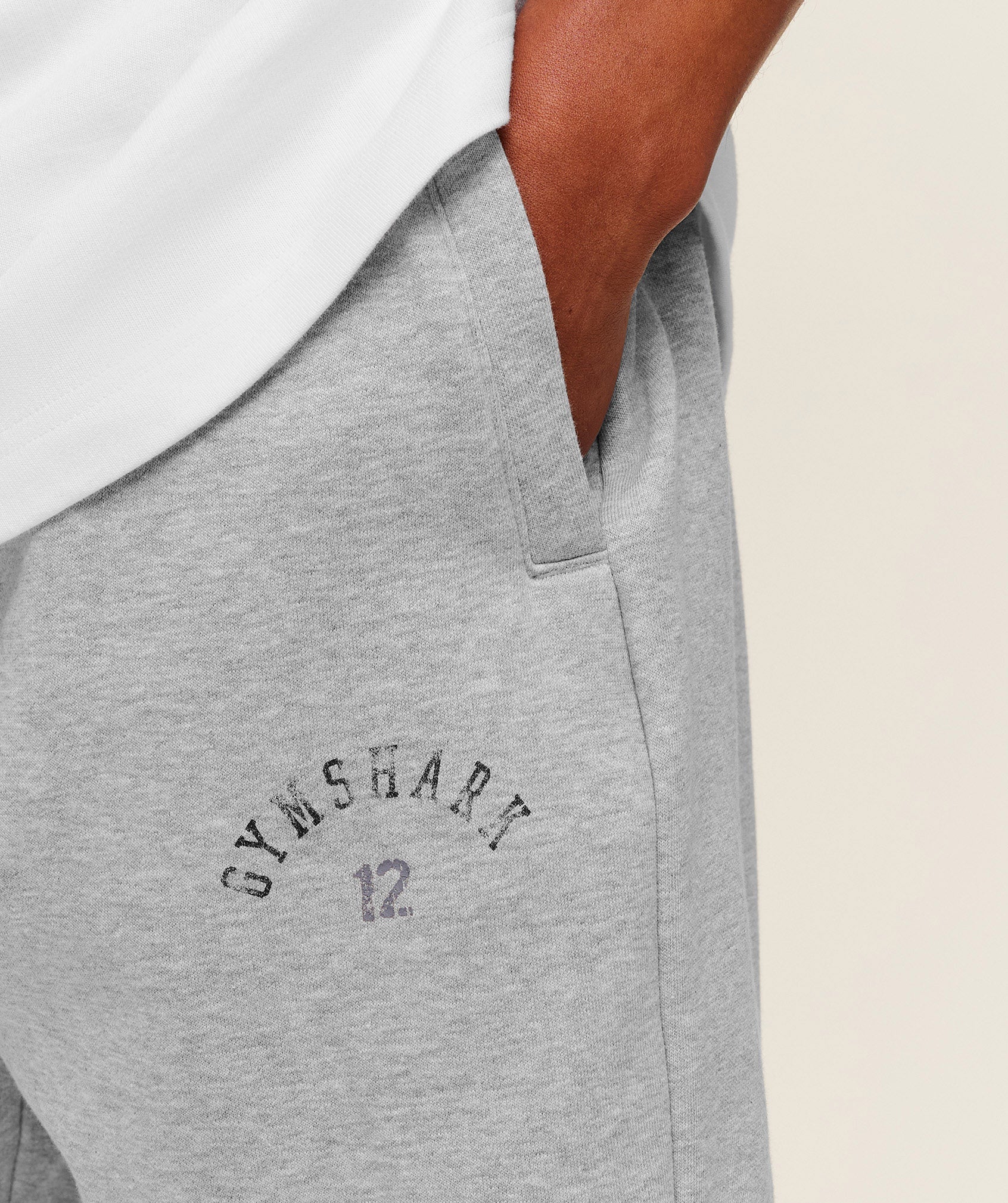 gymshark-12-graphic-jogger-pants-grey-ss26