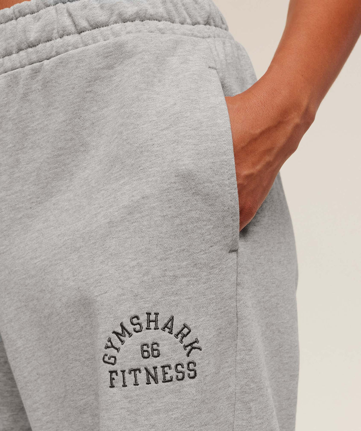gymshark-fitness-embroidered-graphic-wide-leg-joggers-pants-grey-aw25