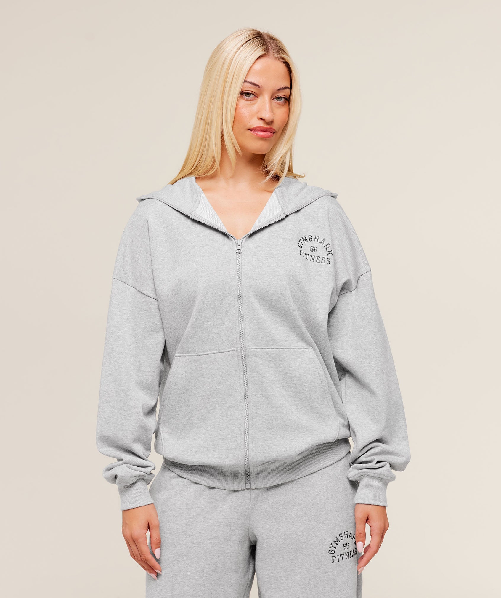 gymshark-fitness-embroidered-graphic-zip-up-hoodie-pullovers-grey-aw25-1