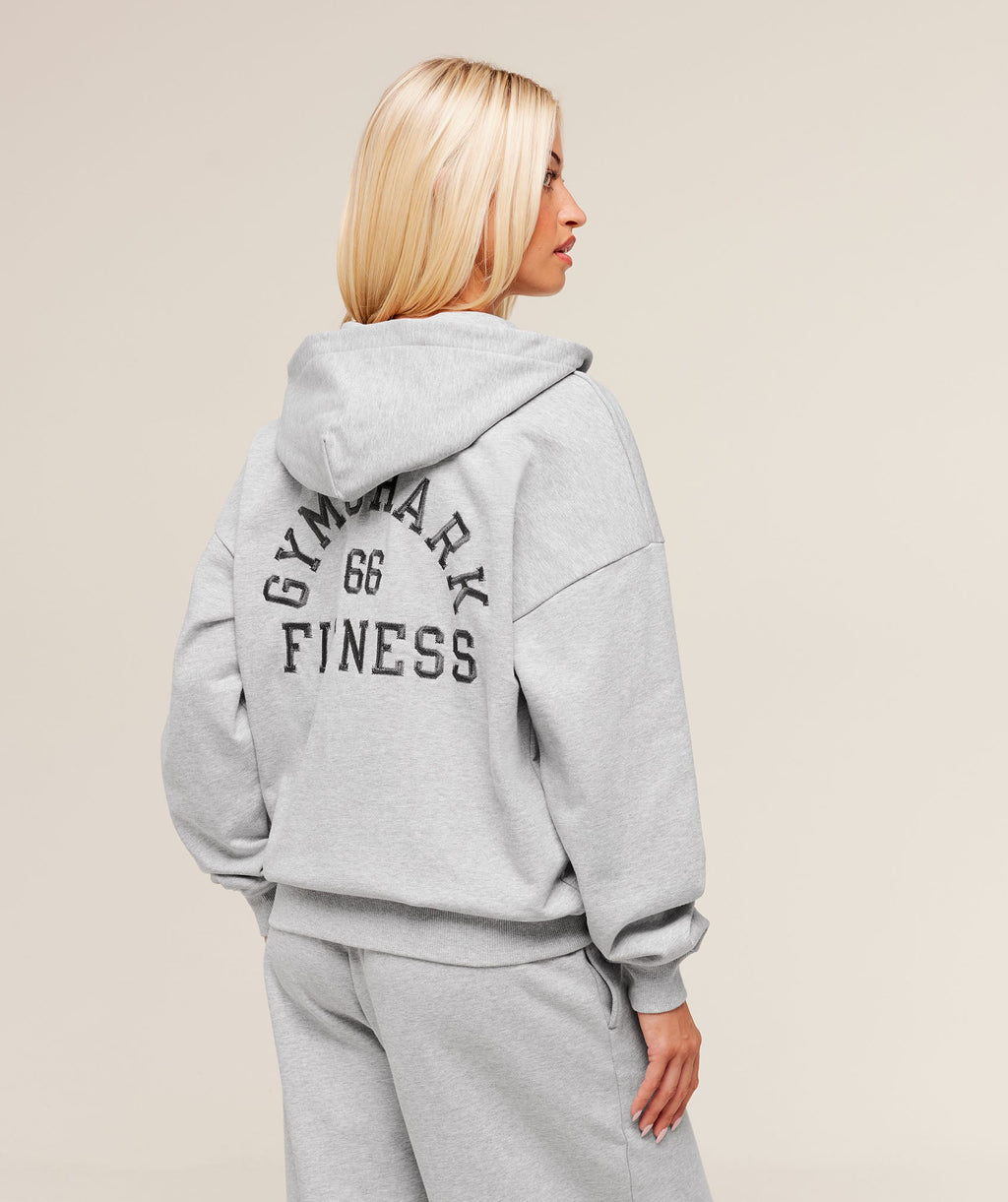 gymshark-fitness-embroidered-graphic-zip-up-hoodie-pullovers-grey-aw25-1