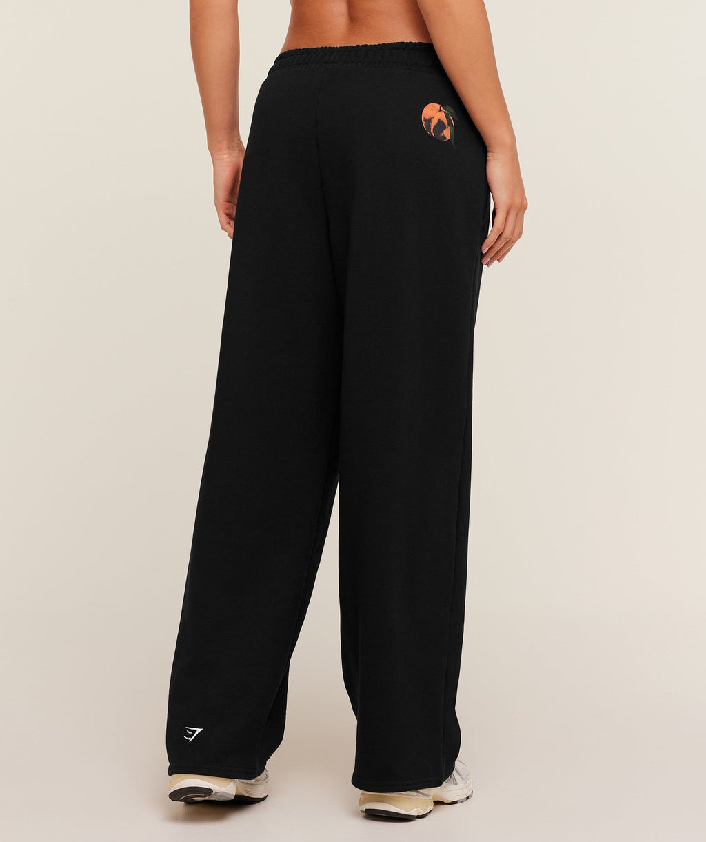 gymshark-juice-peach-wide-leg-joggers-pants-black-aw25