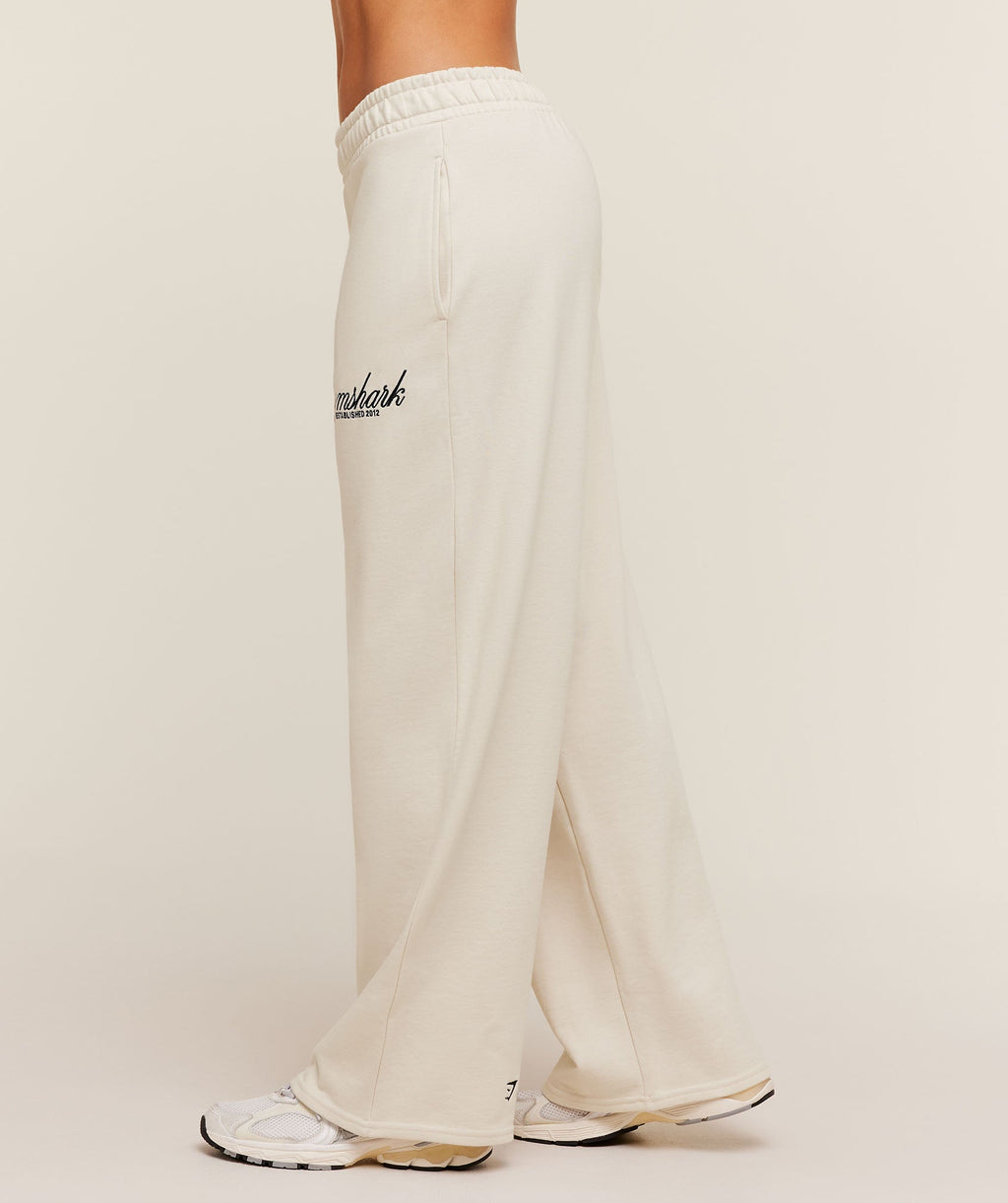 gymshark-juice-peach-wide-leg-joggers-pants-white-aw25