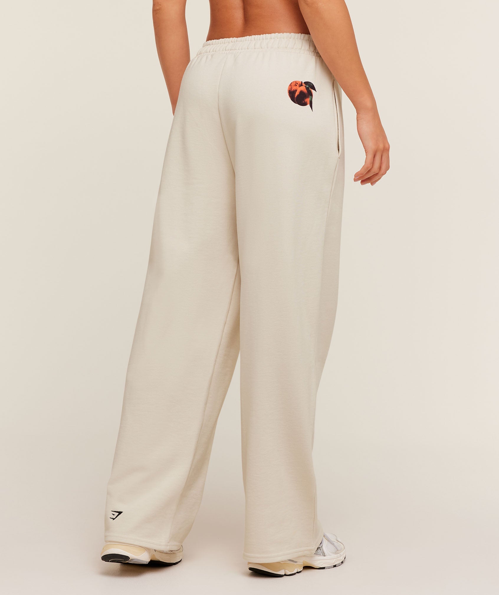 gymshark-juice-peach-wide-leg-joggers-pants-white-aw25