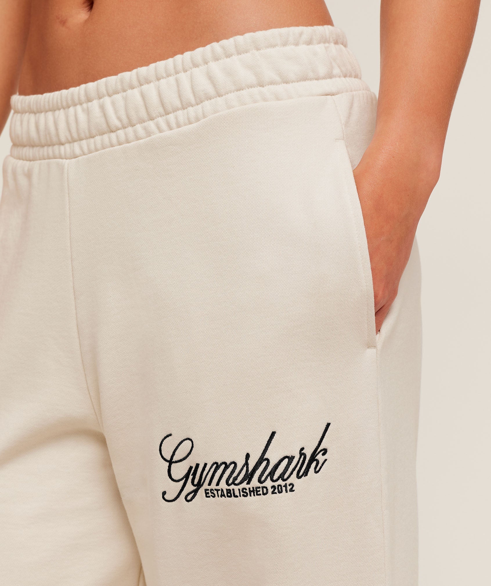 gymshark-juice-peach-wide-leg-joggers-pants-white-aw25