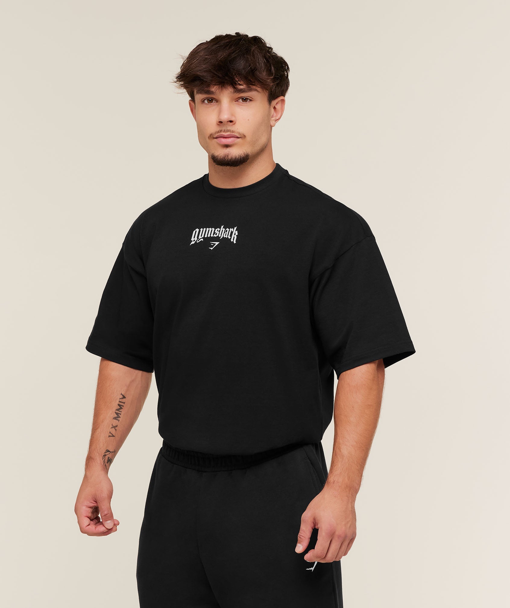 gymshark-outline-graphic-t-shirt-ss-tops-black-aw25