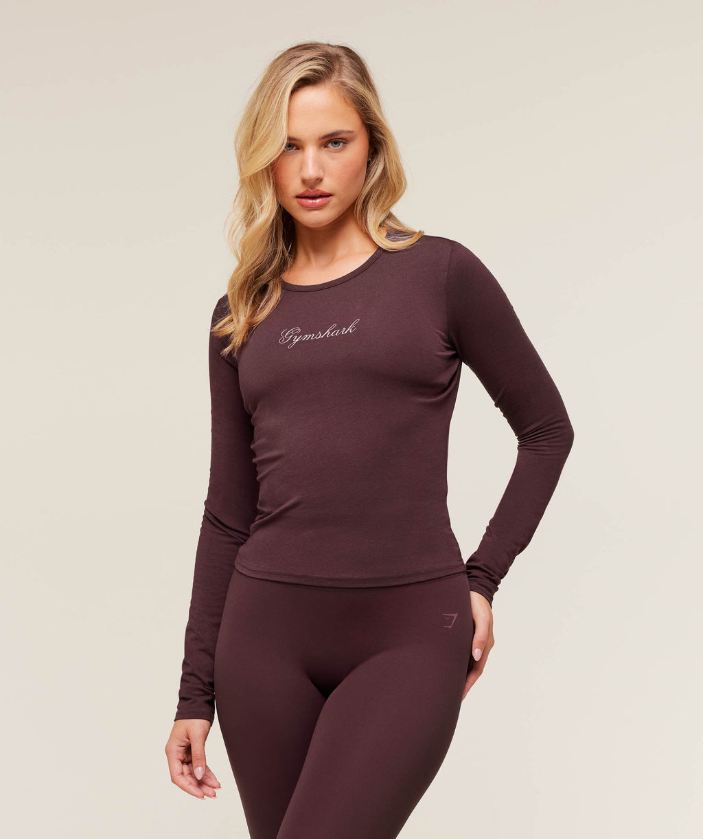 gymshark-all-seasons-graphic-long-sleeve-baby-tee-crop-tops
