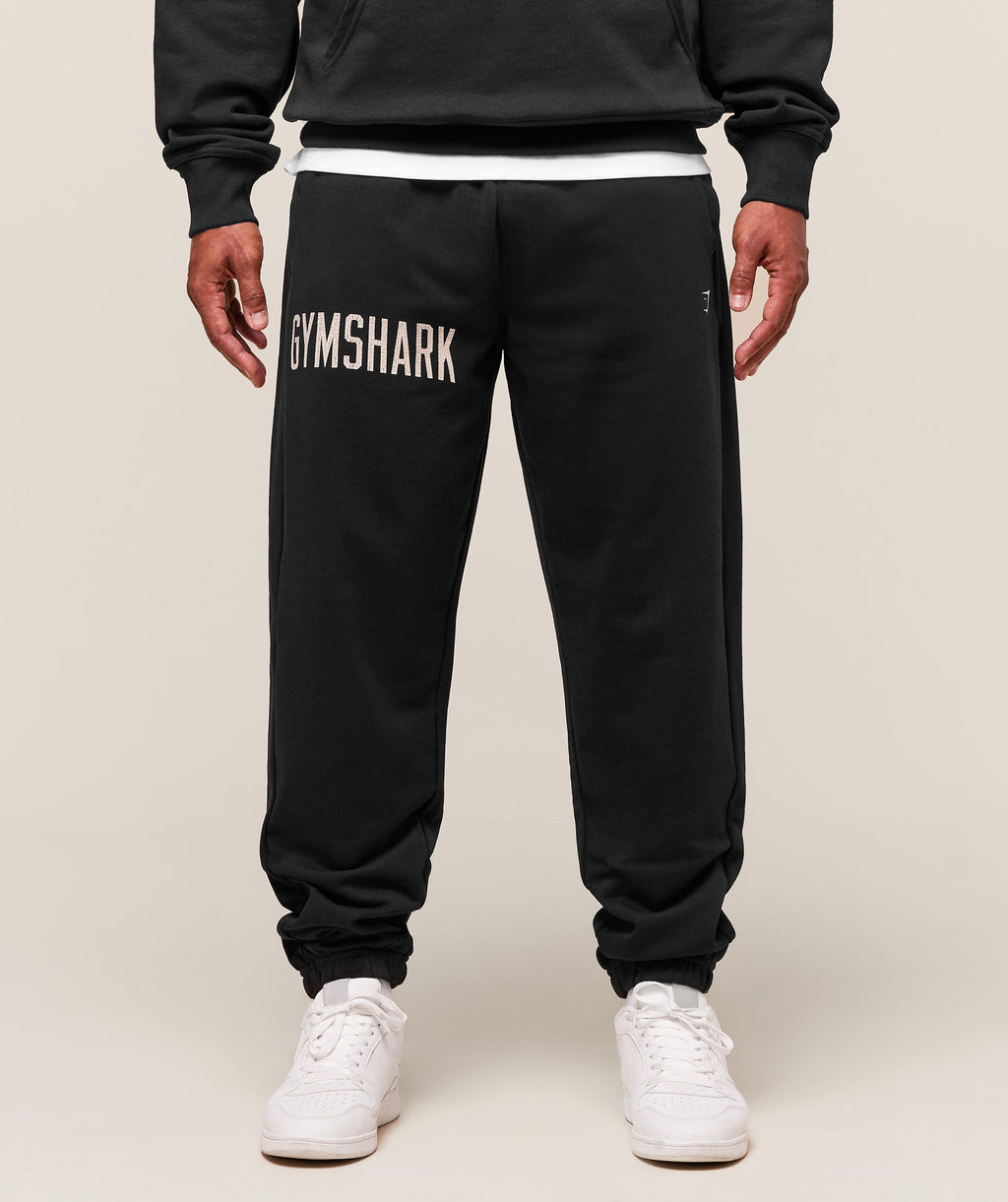 gymshark-worn-graphic-jogger-pants-black-aw25