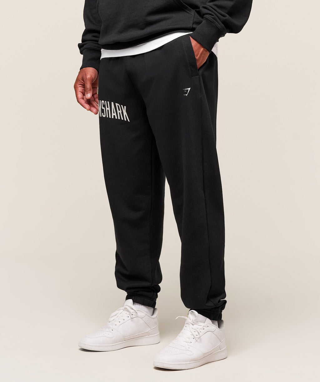 gymshark-worn-graphic-jogger-pants-black-aw25