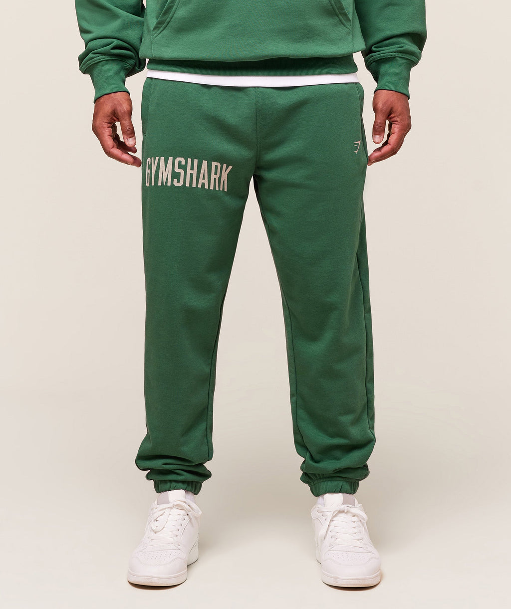gymshark-worn-graphic-jogger-pants-green-aw25