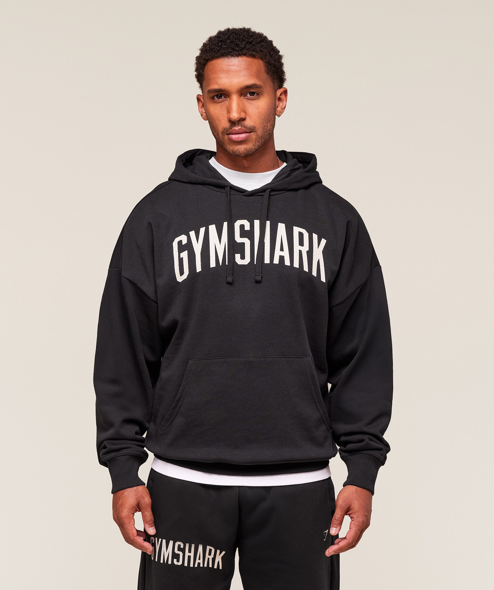 gymshark-worn-graphic-hoodie-pullovers-black-aw25