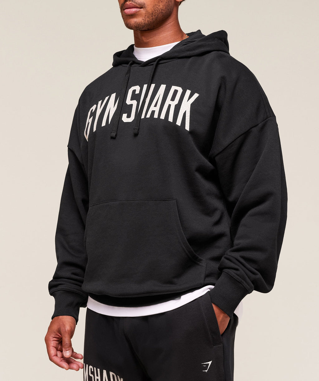 gymshark-worn-graphic-hoodie-pullovers-black-aw25