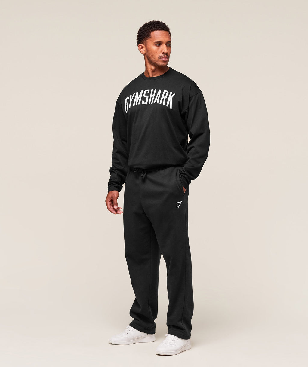 gymshark-worn-graphic-long-sleeve-t-shirt-ls-tops-black-aw25