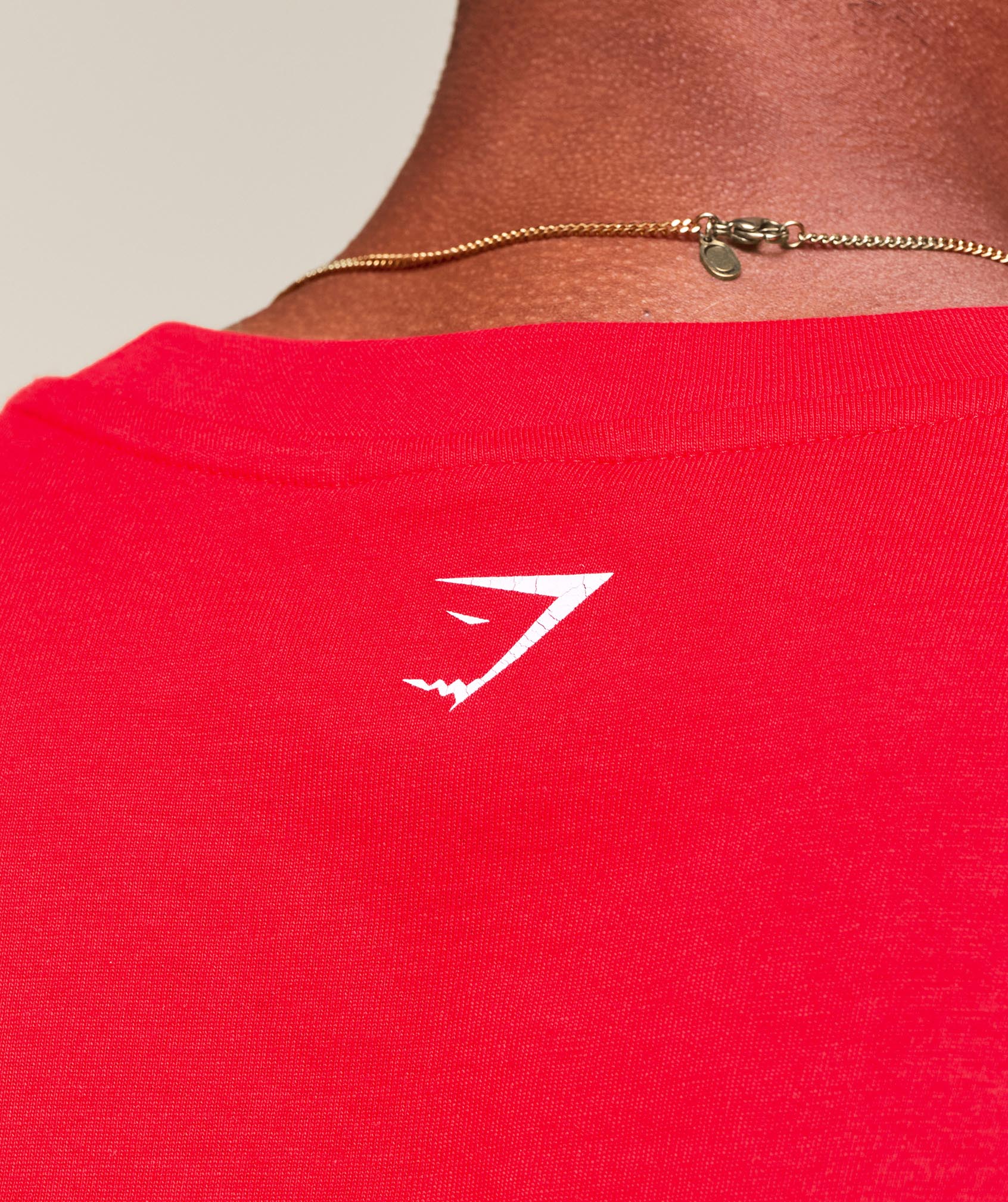 gymshark-worn-graphic-t-shirt-ss-tops-red-aw25