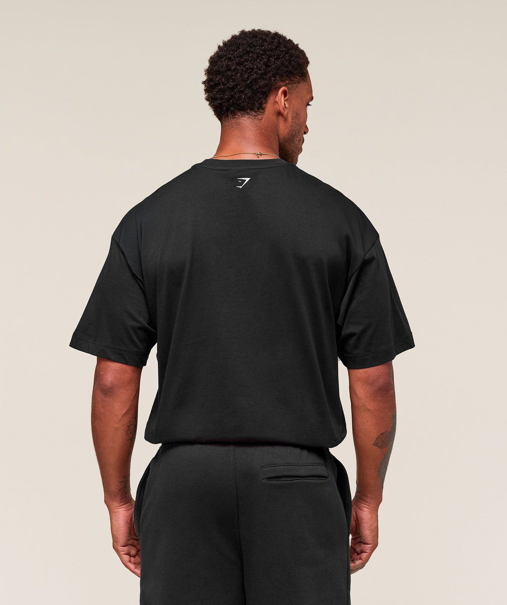 gymshark-worn-graphic-t-shirt-ss-tops-black-aw25