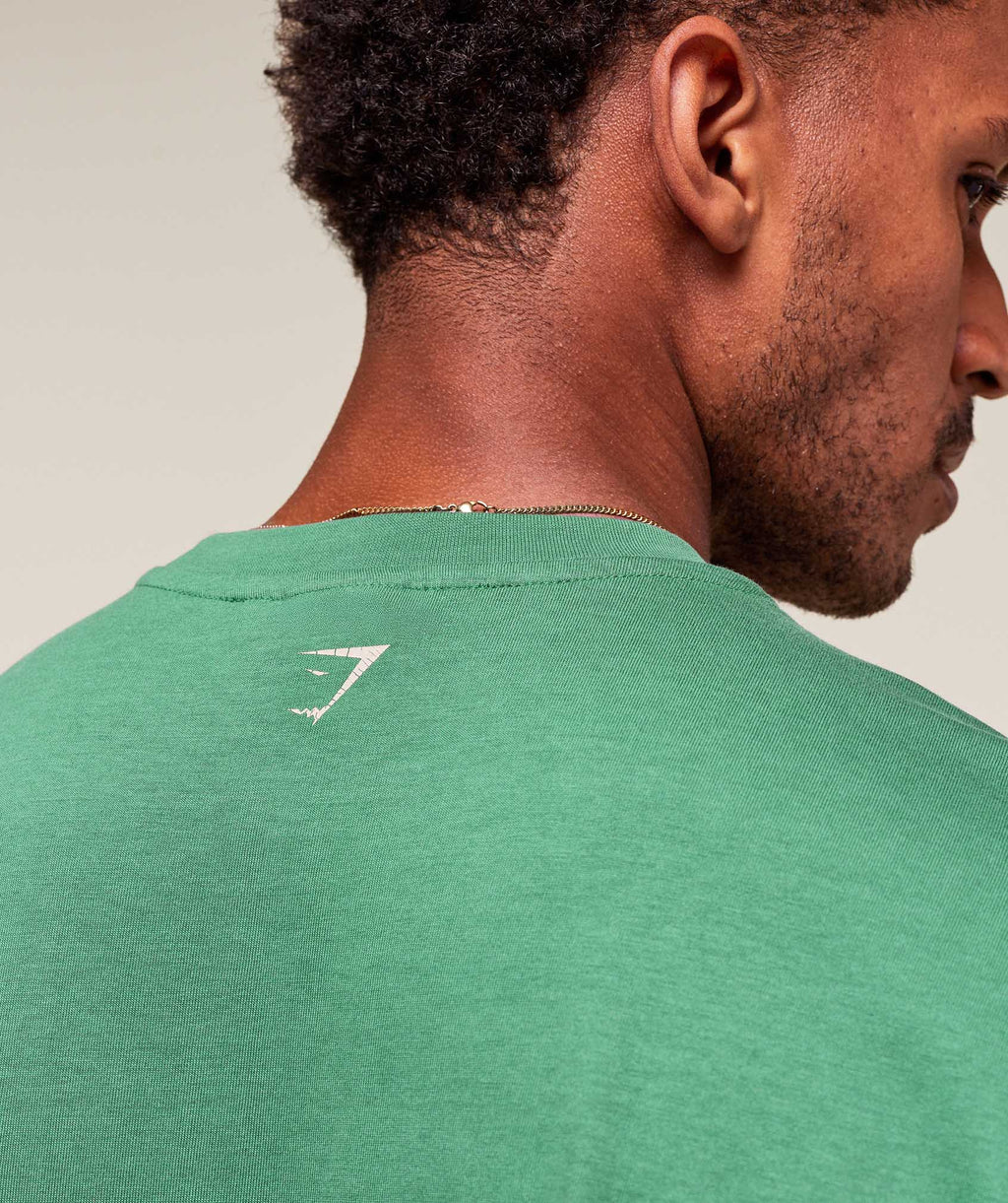 gymshark-worn-graphic-t-shirt-ss-tops-green-aw25