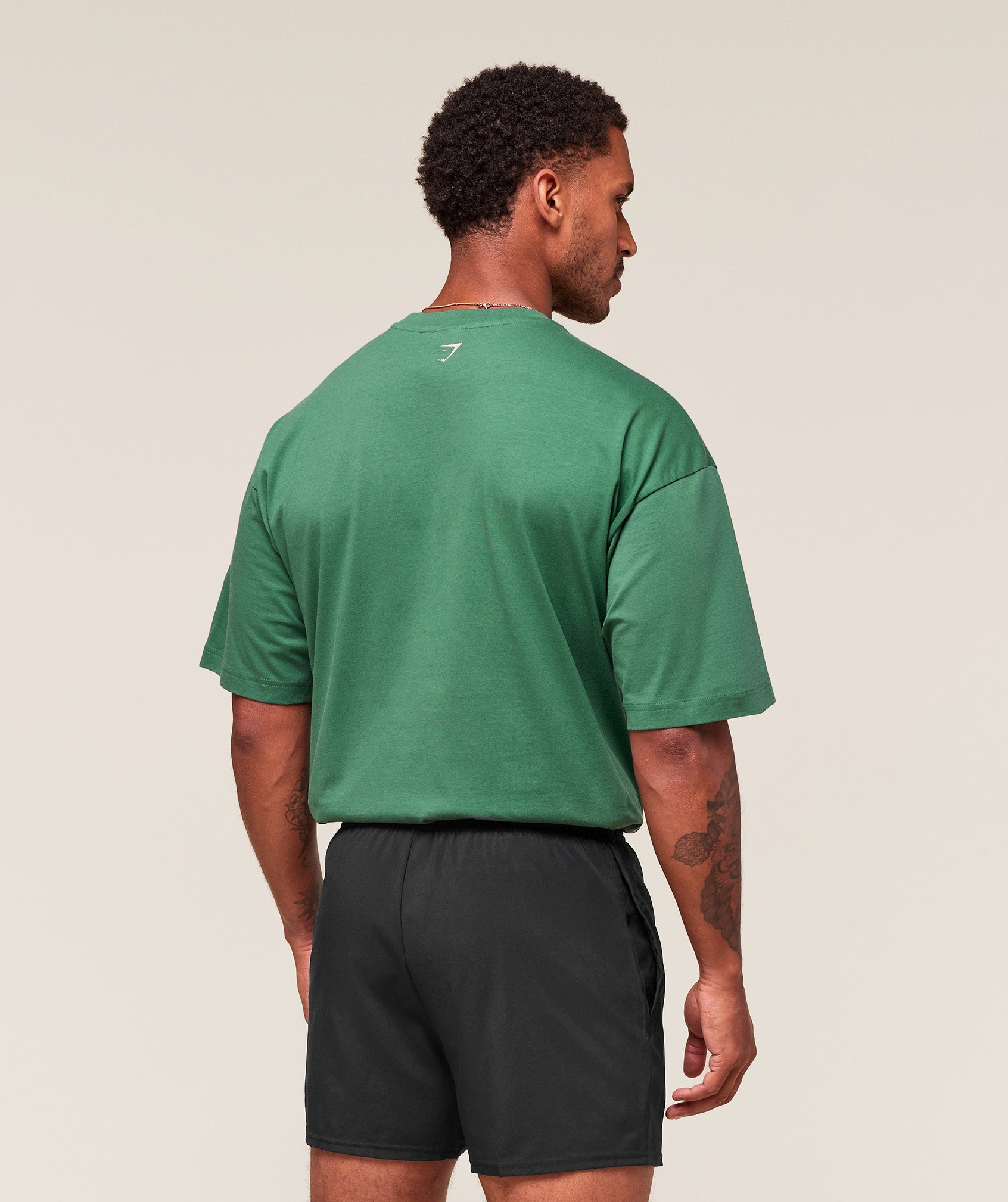 gymshark-worn-graphic-t-shirt-ss-tops-green-aw25