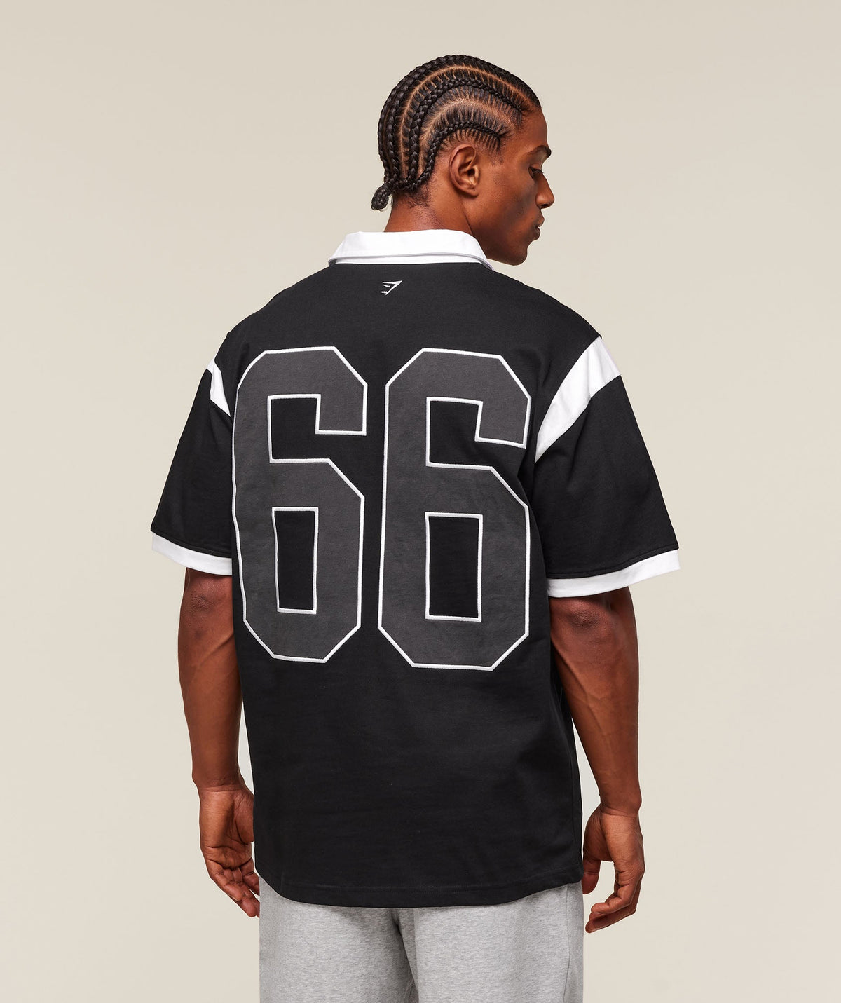 gymshark-collegiate-retro-polo-shirt-ss-tops-black-ss25