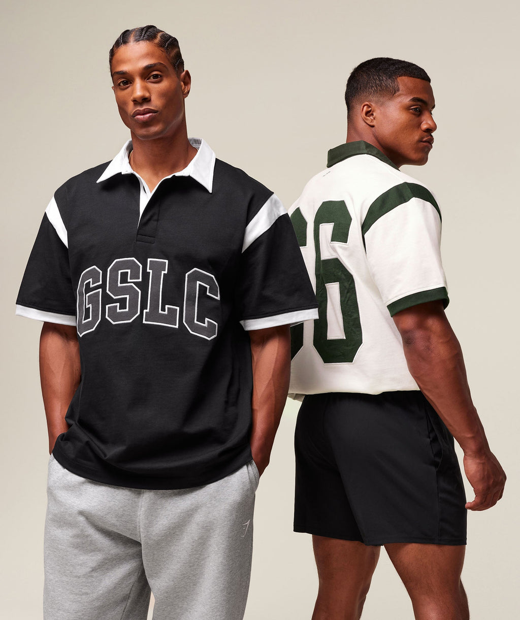gymshark-collegiate-retro-polo-shirt-ss-tops-black-ss25