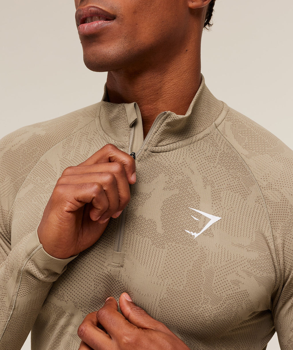 gymshark-geo-seamless-1-4-zip-pullovers-brown-aw25-1