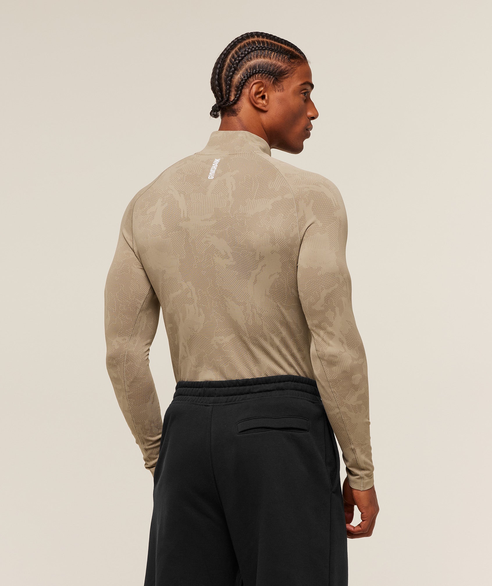 gymshark-geo-seamless-1-4-zip-pullovers-brown-aw25-1