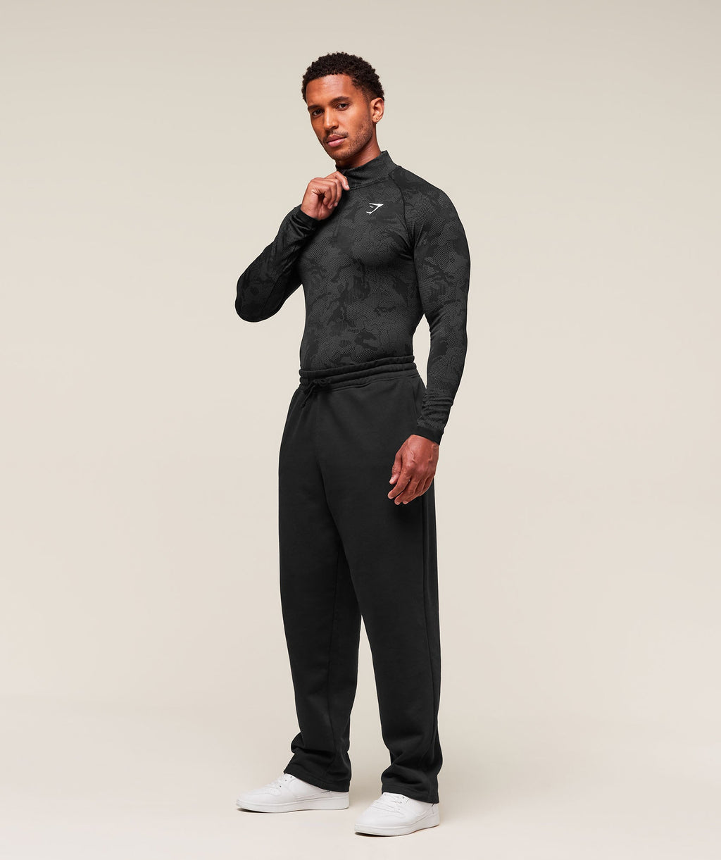 gymshark-geo-seamless-1-4-zip-pullovers-black-ss25