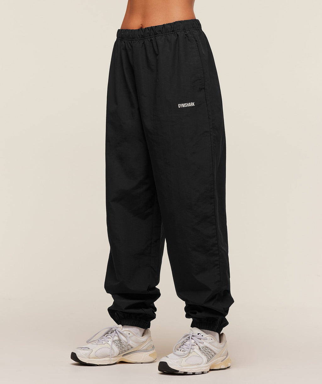 gymshark-woven-track-pant-pants-black-aw25
