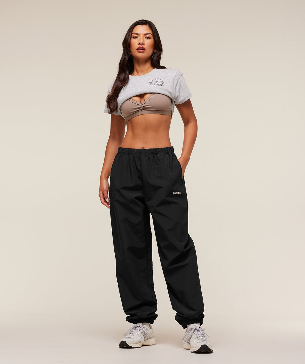 gymshark-woven-track-pant-pants-black-aw25