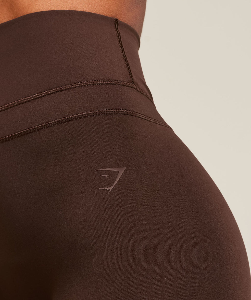 gymshark-gymshark-x-whitney-simmons-tall-flared-leggings-leggings-brown-ss25