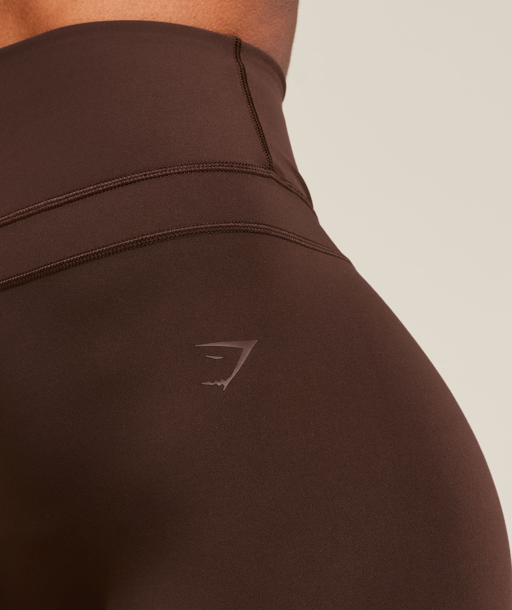 gymshark-gymshark-x-whitney-simmons-tall-flared-leggings-leggings-brown-ss25