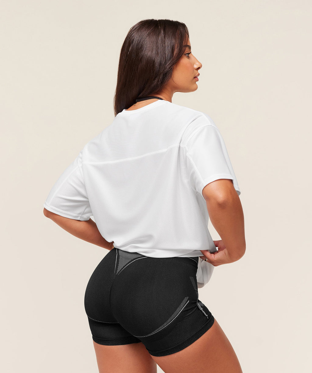gymshark-gymshark-x-analis-mesh-ss-top-ss-tops-white-aw25
