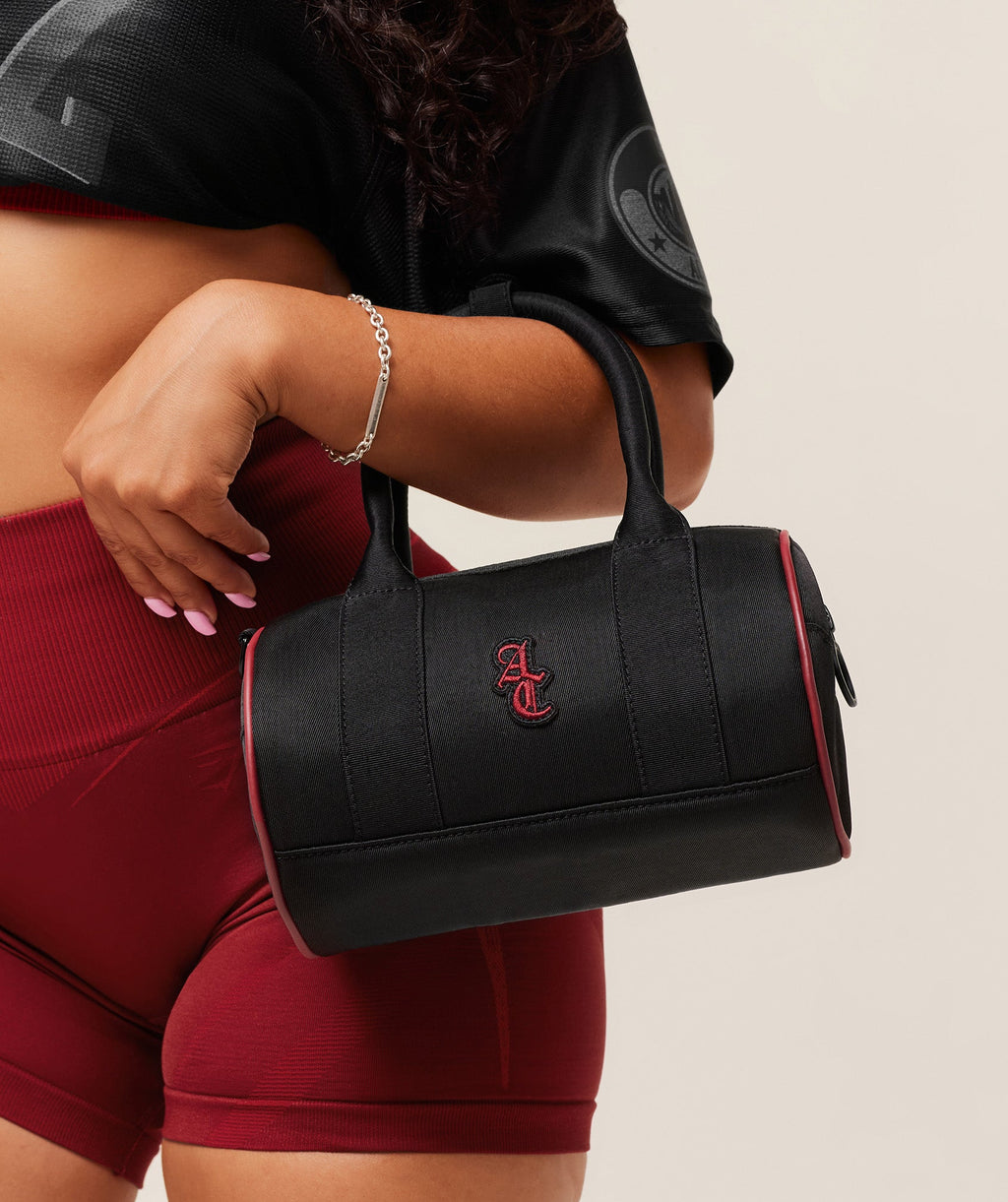 gymshark-gymshark-x-analis-mini-barrel-bag-bags-black-aw25