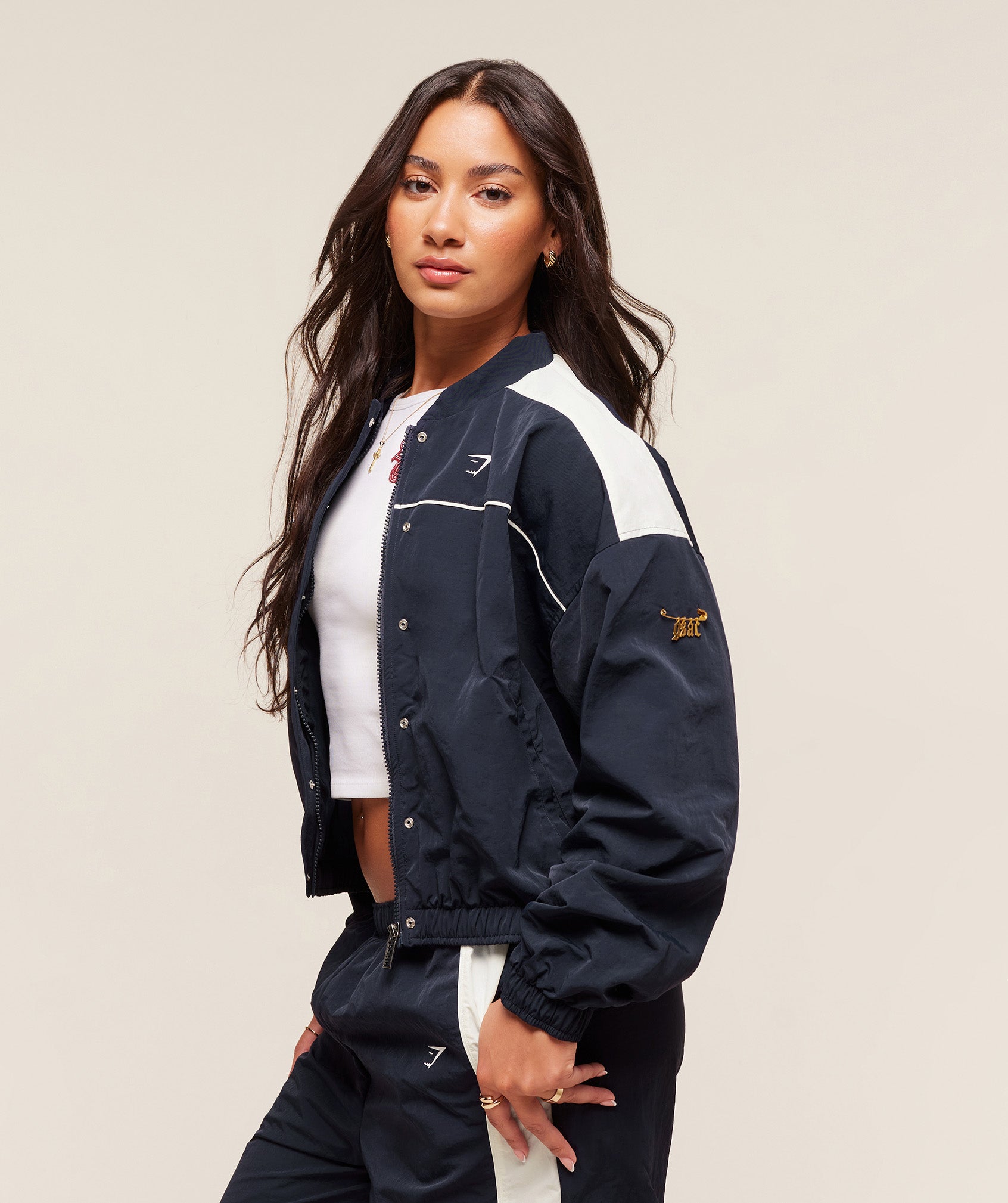 gymshark-gymshark-x-analis-woven-track-jacket-jackets-outerwear-blue-aw25