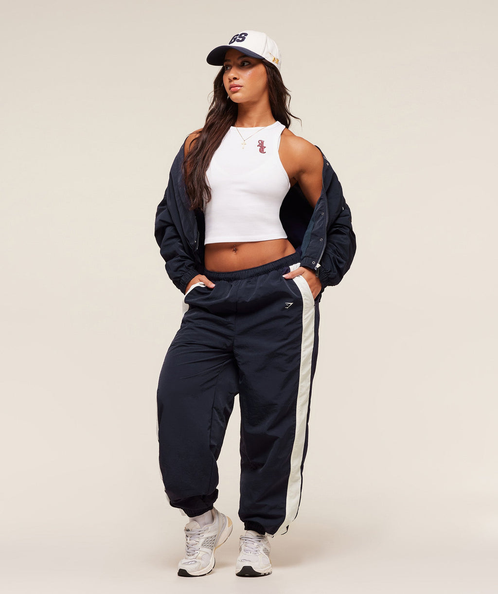 gymshark-gymshark-x-analis-woven-track-jacket-jackets-outerwear-blue-aw25