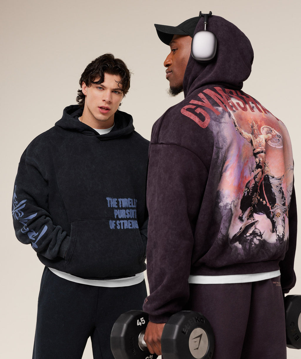 gymshark-frazetta-graphic-hoodie-pullovers-black-aw25