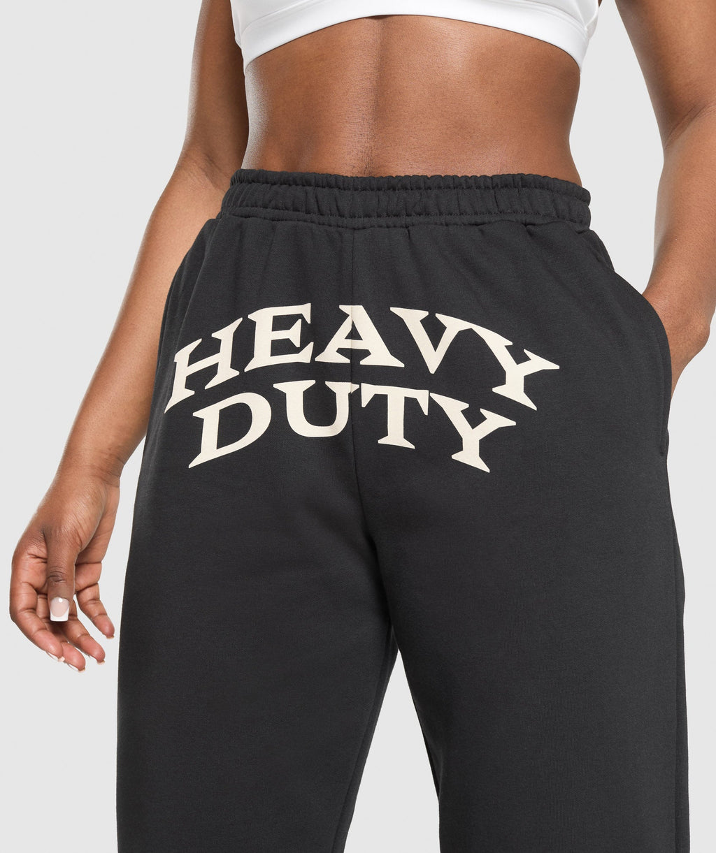 gymshark-heavy-duty-graphic-loopback-jogger-pants-black-ss25