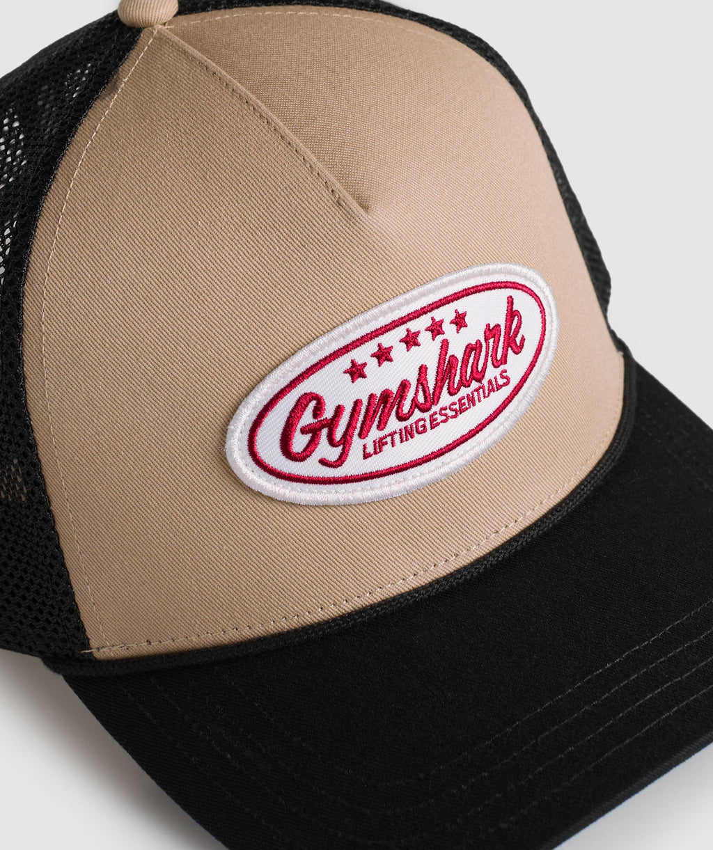 gymshark-trucker-cap-headwear-brown-ss25