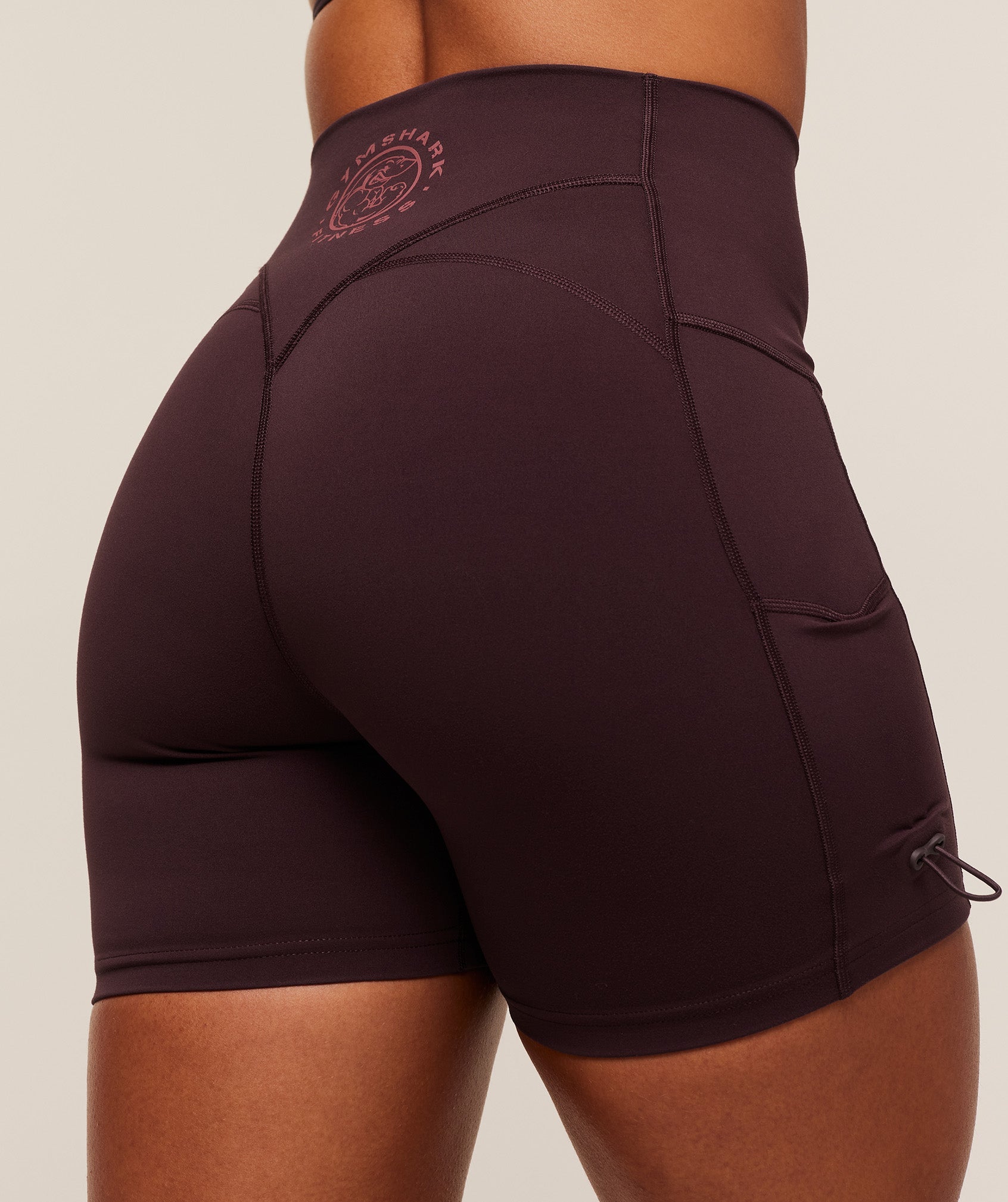 gymshark-legacy-logo-tight-shorts-shorts-purple-aw25