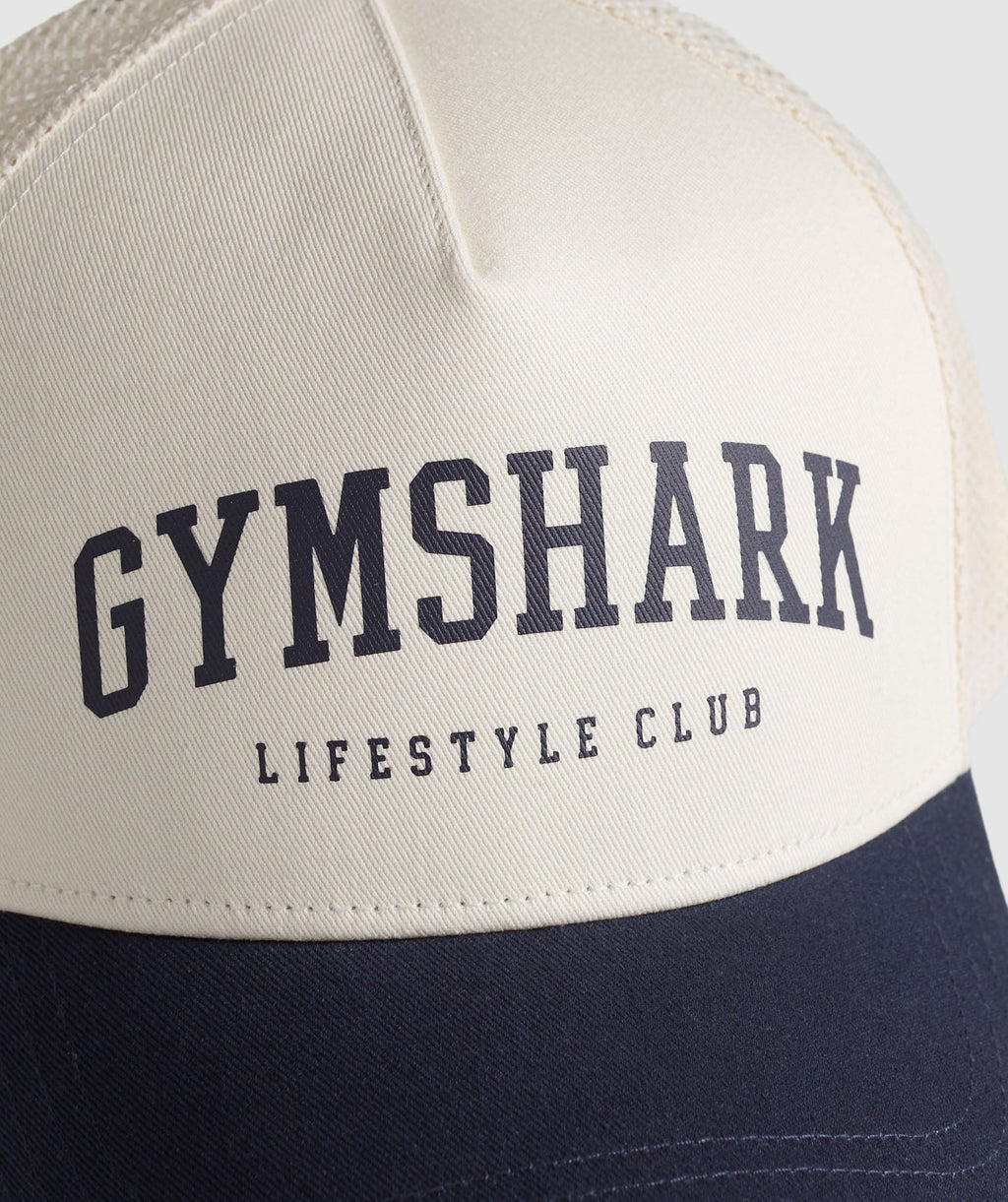gymshark-collegiate-trucker-headwear-blue-ss25