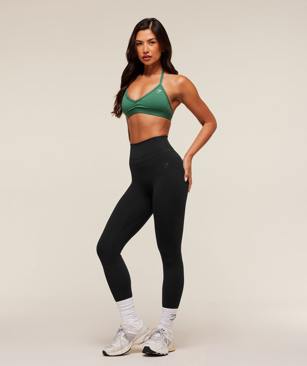 gymshark-light-support-minimal-halterneck-bra-sports-bras-green-aw25-1