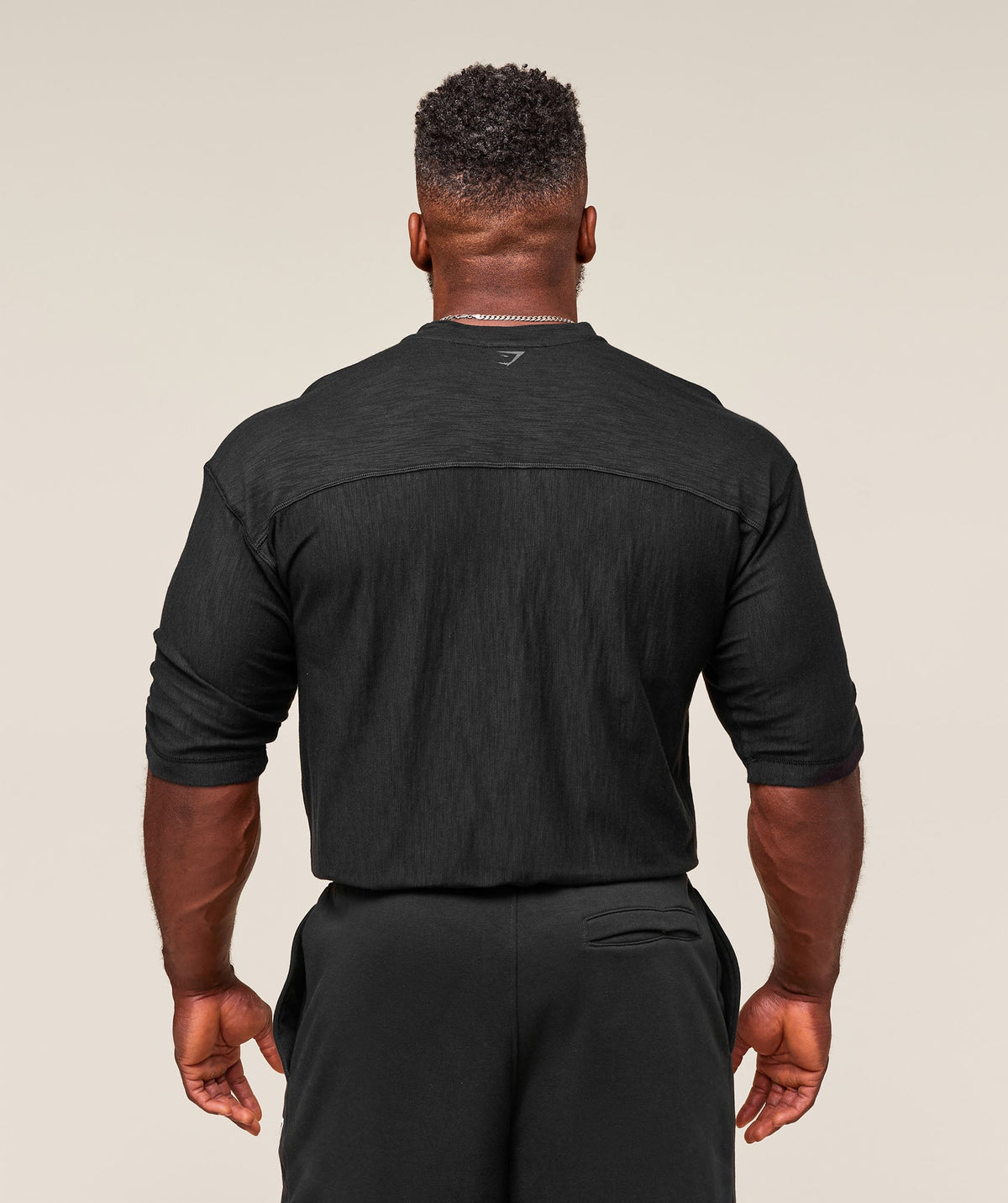 gymshark-lightweight-slub-textured-3-4-henley-ls-tops-black-ss25