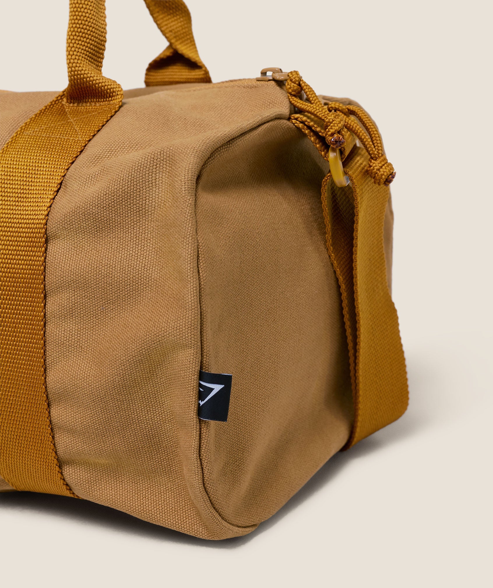 gymshark-strength-dept-mini-canvas-duffle-bag-bags-yellow-aw25
