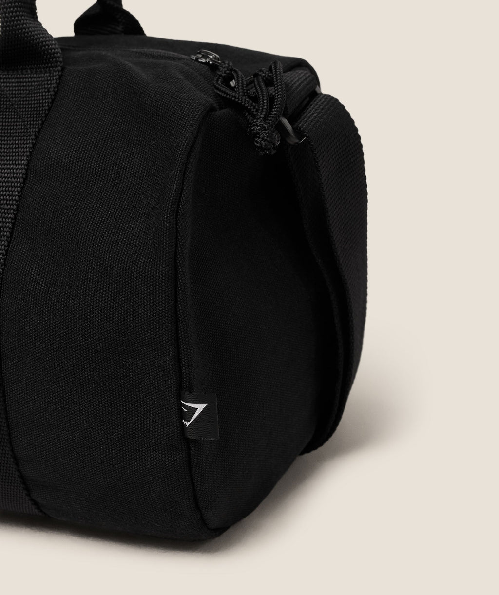 gymshark-strength-dept-mini-canvas-duffle-bag-bags-black-aw25
