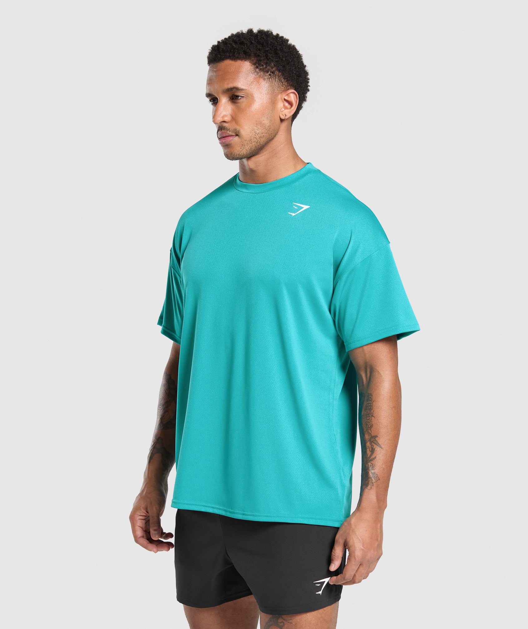 gymshark-oversized-performance-t-shirt-ss-tops-teal-ss25