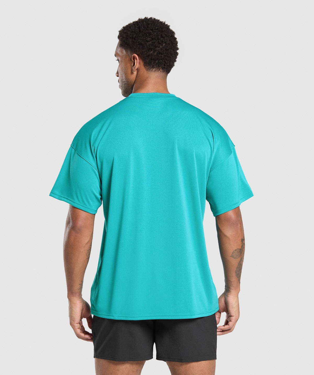 gymshark-oversized-performance-t-shirt-ss-tops-teal-ss25