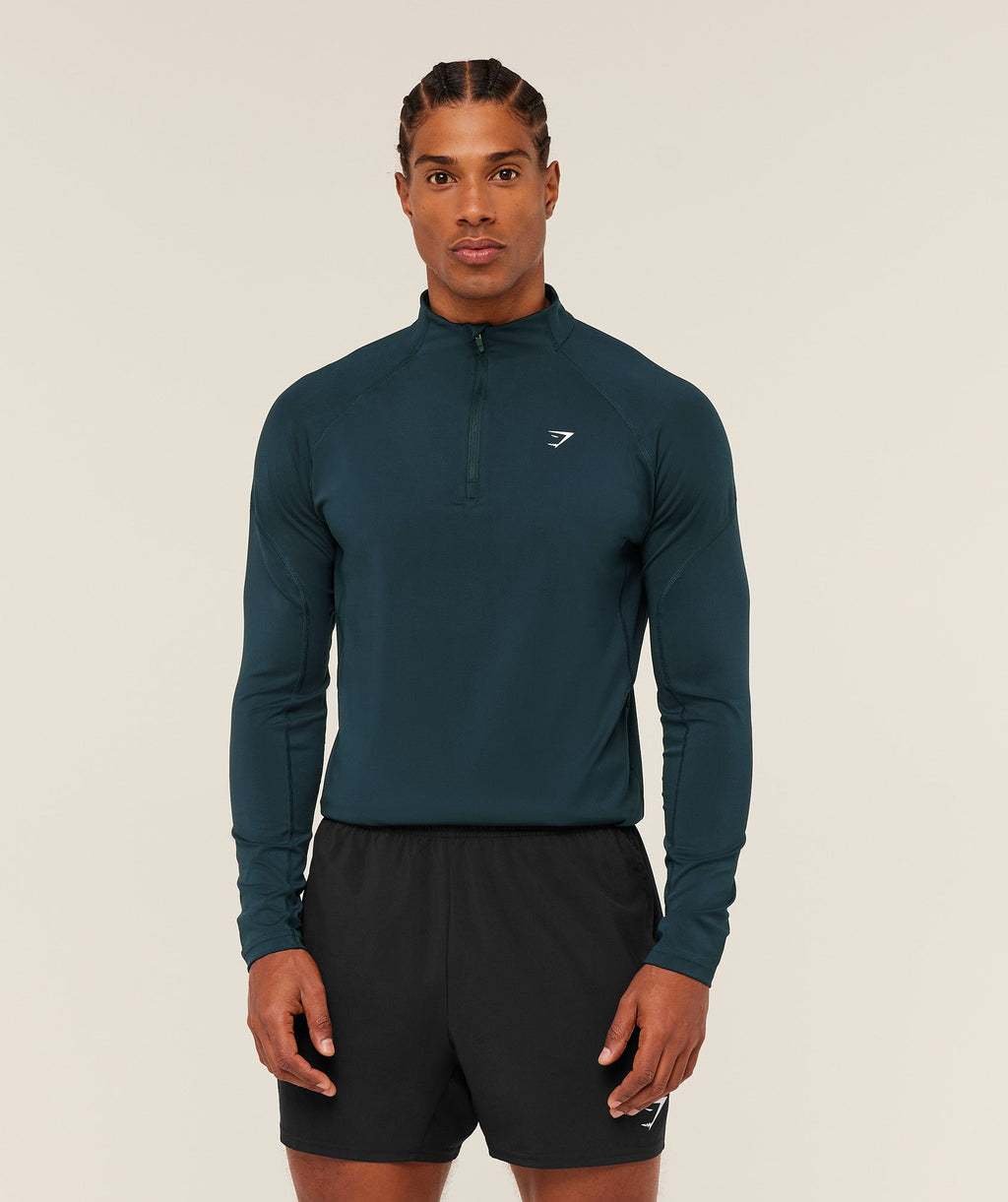 gymshark-performance-1-4-zip-pullovers-blue-ss26