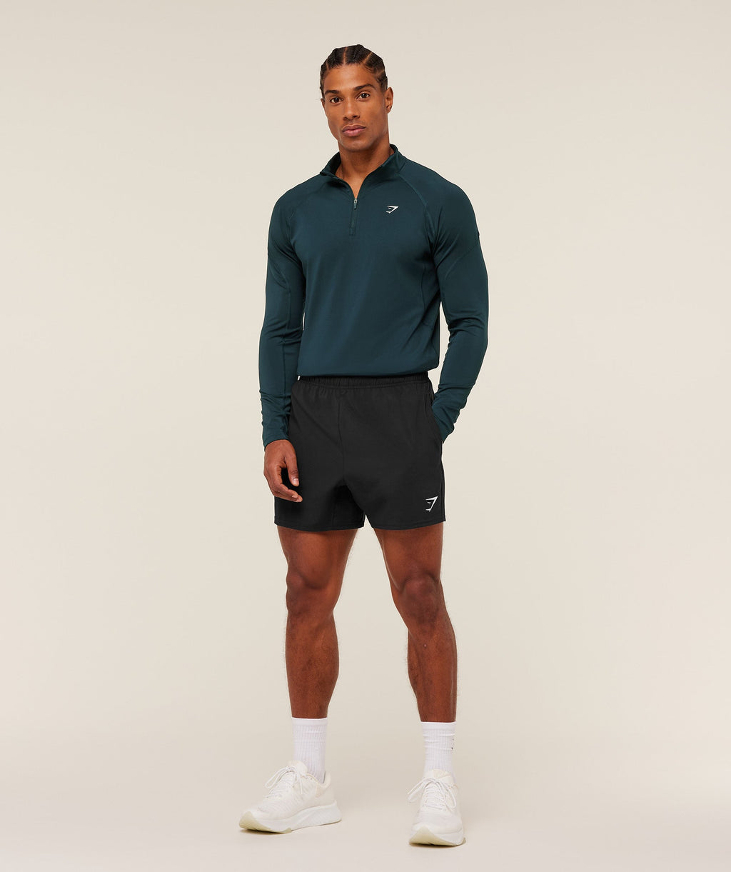 gymshark-performance-1-4-zip-pullovers-blue-ss26